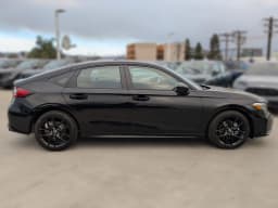Honda Civic Hatchback Hybrid Sport CVT 2026 — side view