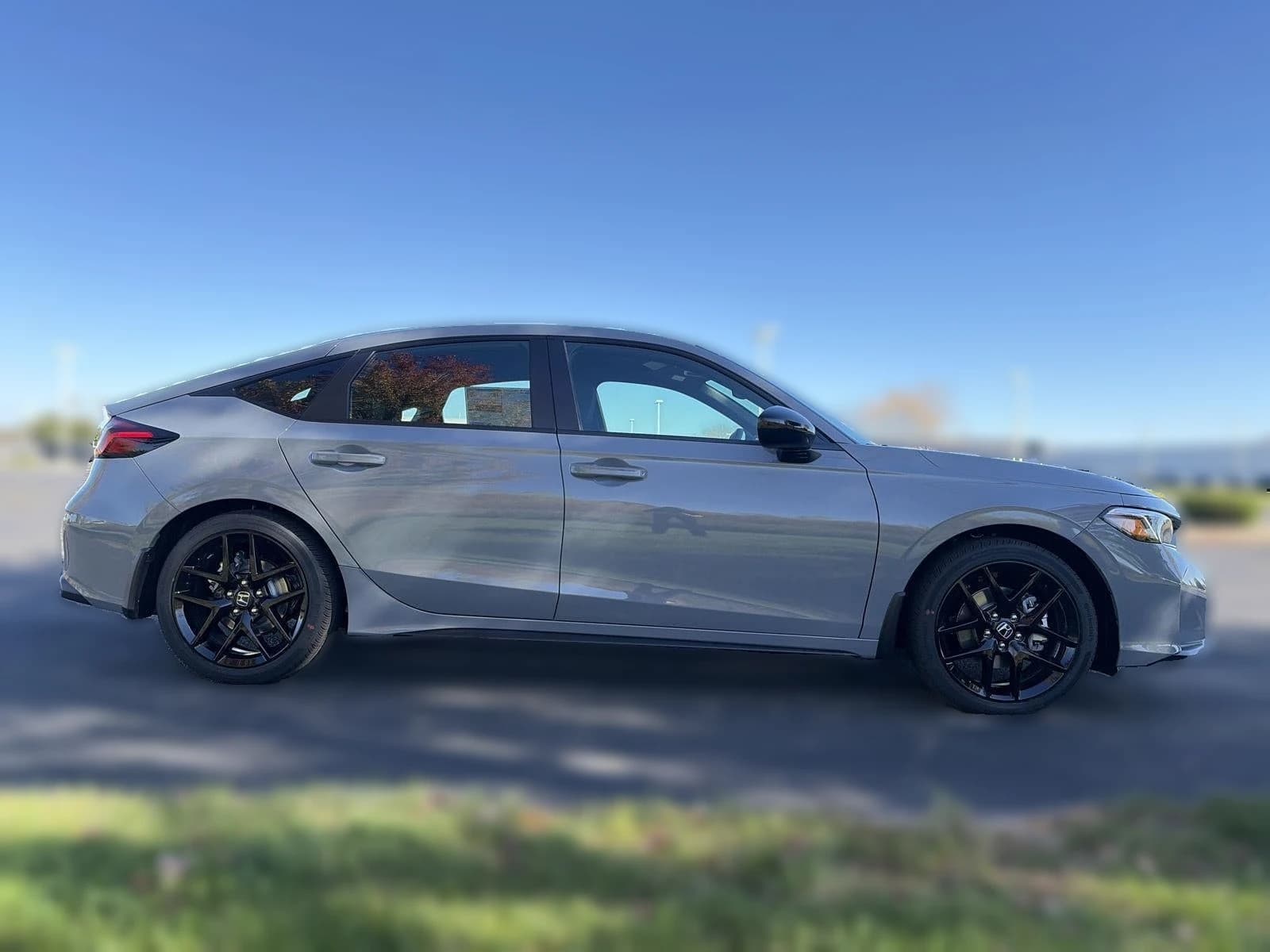 Honda Civic Hatchback Hybrid Sport CVT 2026 — side view