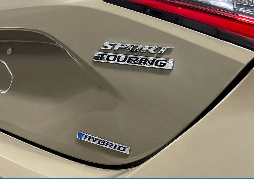 Honda Civic Hatchback Hybrid Sport Touring CVT 2026 — side view