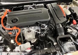 Honda Civic Hatchback Hybrid Sport Touring CVT 2026 — side view