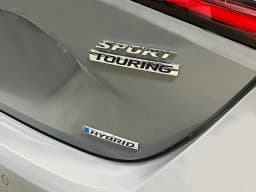 Honda Civic Hatchback Hybrid Sport Touring CVT 2026 — side view