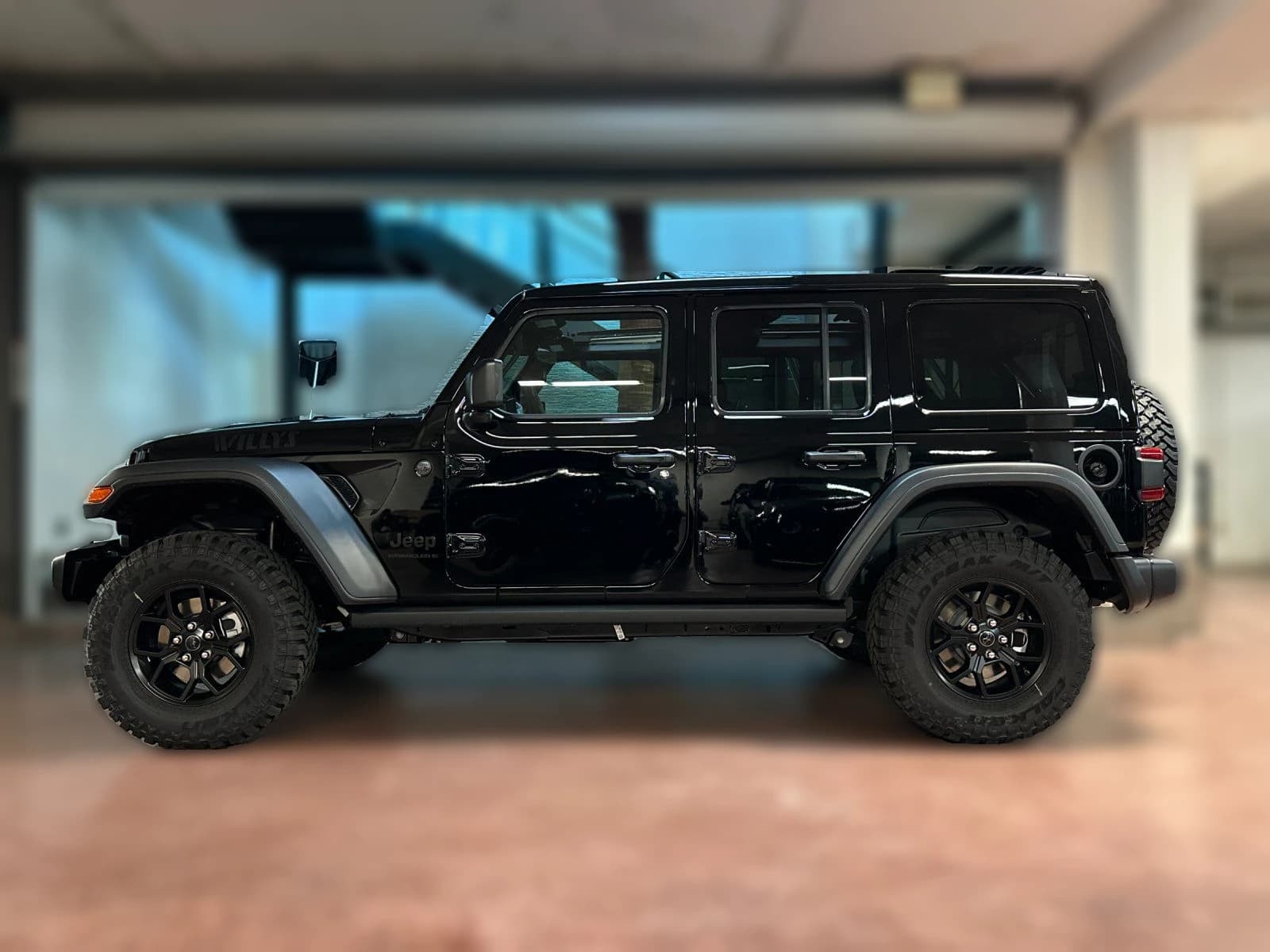 Jeep Wrangler Willys 4 Door 4x4 2025 — side view
