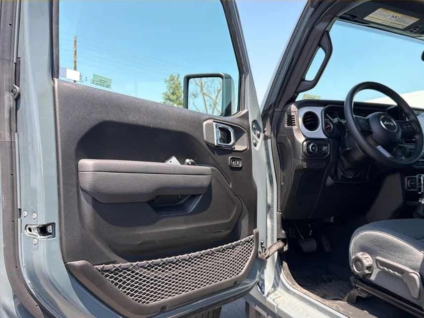 Jeep Wrangler Sport 4 Door 4x4 2026 — side view