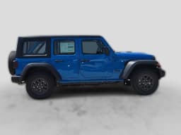 Jeep Wrangler Sport 4 Door 4x4 2026 — side view