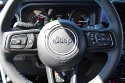 Jeep Wrangler 4xe Rubicon 4x4 2025 — side view