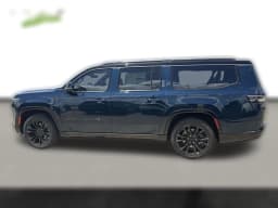 Jeep Grand Wagoneer L Summit Obsidian 4x4 2026 — side view