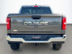 Ram 1500 Big Horn 4x2 Quad Cab 6'4" Box 2026 — side view