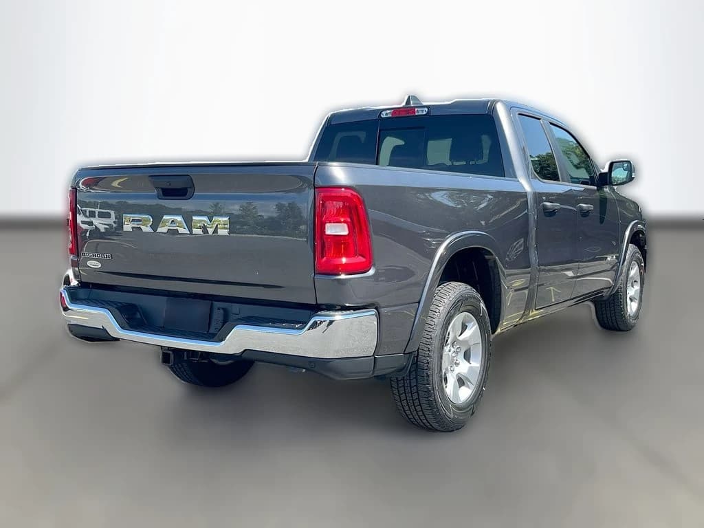 Ram 1500 Big Horn 4x2 Quad Cab 6'4" Box 2026 — side view