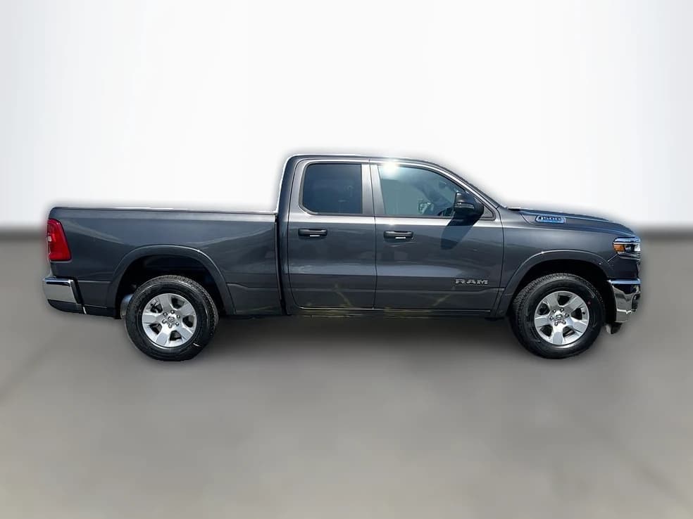 Ram 1500 Big Horn 4x2 Quad Cab 6'4" Box 2026 — side view