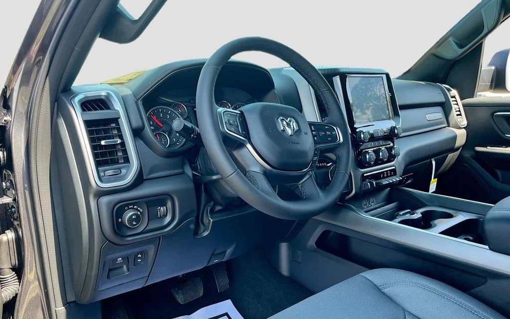 Ram 1500 Big Horn 4x2 Quad Cab 6'4" Box 2026 — side view