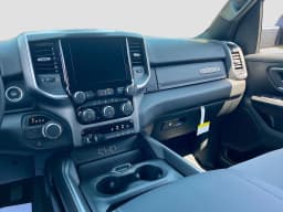 Ram 1500 Big Horn 4x2 Quad Cab 6'4" Box 2026 — side view