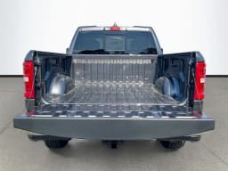 Ram 1500 Big Horn 4x2 Quad Cab 6'4" Box 2026 — side view