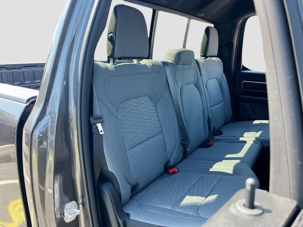 Ram 1500 Big Horn 4x2 Quad Cab 6'4" Box 2026 — side view