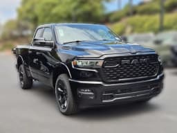 Ram 1500 Big Horn 4x2 Quad Cab 6'4" Box 2026 — side view