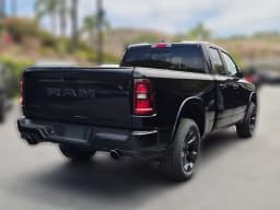 Ram 1500 Big Horn 4x2 Quad Cab 6'4" Box 2026 — side view