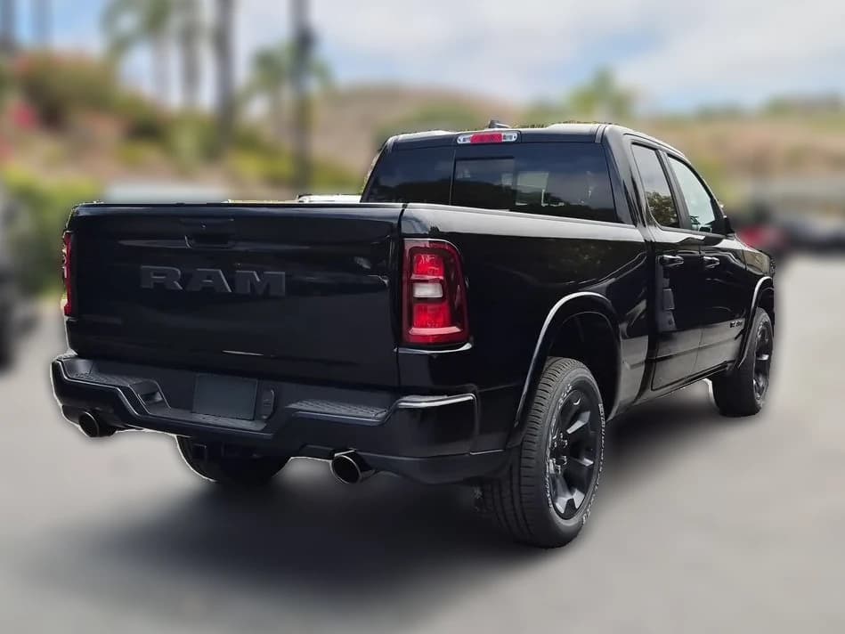 Ram 1500 Big Horn 4x2 Quad Cab 6'4" Box 2026 — side view
