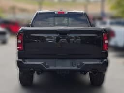 Ram 1500 Big Horn 4x2 Quad Cab 6'4" Box 2026 — side view