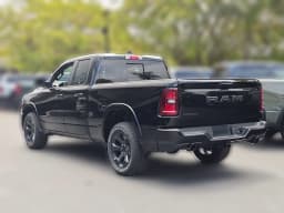 Ram 1500 Big Horn 4x2 Quad Cab 6'4" Box 2026 — side view