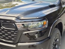 Ram 1500 Big Horn 4x2 Quad Cab 6'4" Box 2026 — side view