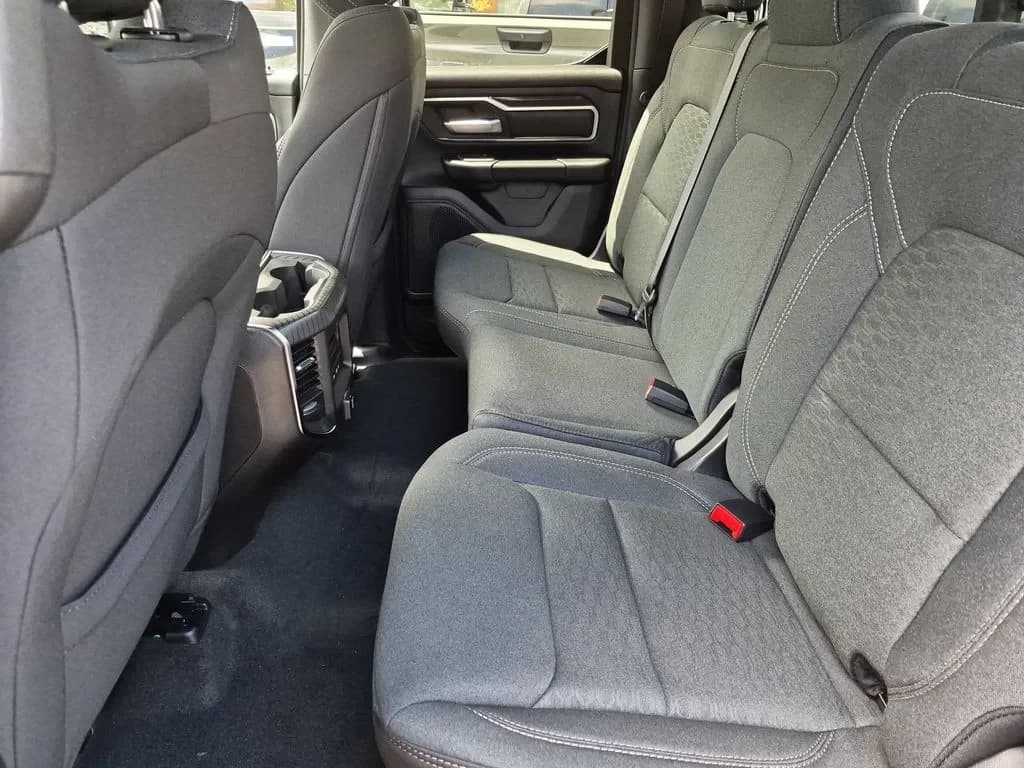 Ram 1500 Big Horn 4x2 Quad Cab 6'4" Box 2026 — side view