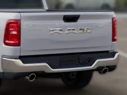 Ram 1500 Tradesman 4x2 Quad Cab 6'4" Box 2026 — side view