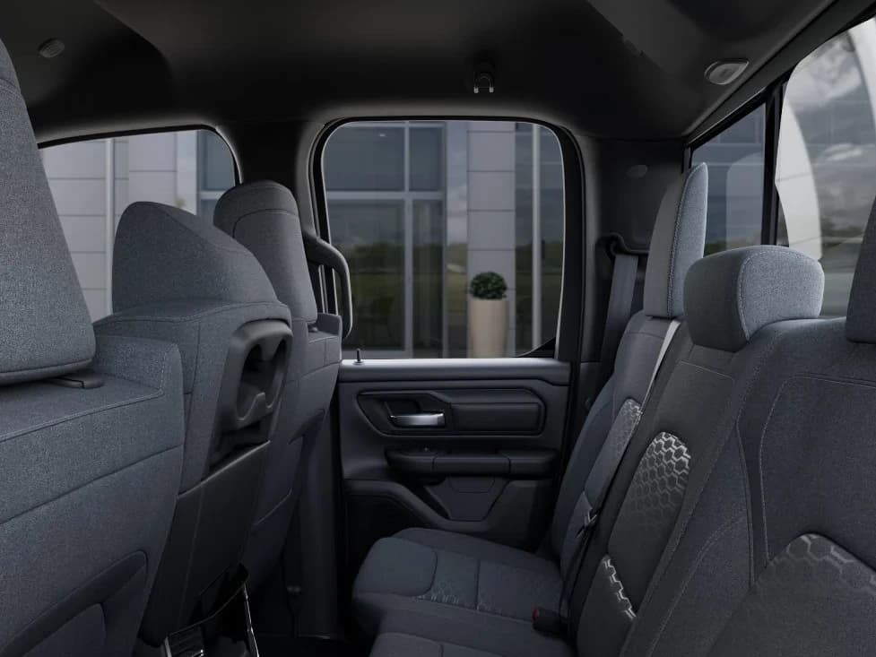 Ram 1500 Tradesman 4x2 Quad Cab 6'4" Box 2026 — side view
