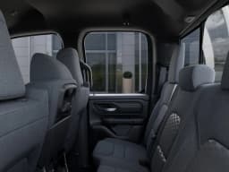 Ram 1500 Tradesman 4x2 Quad Cab 6'4" Box 2026 — side view