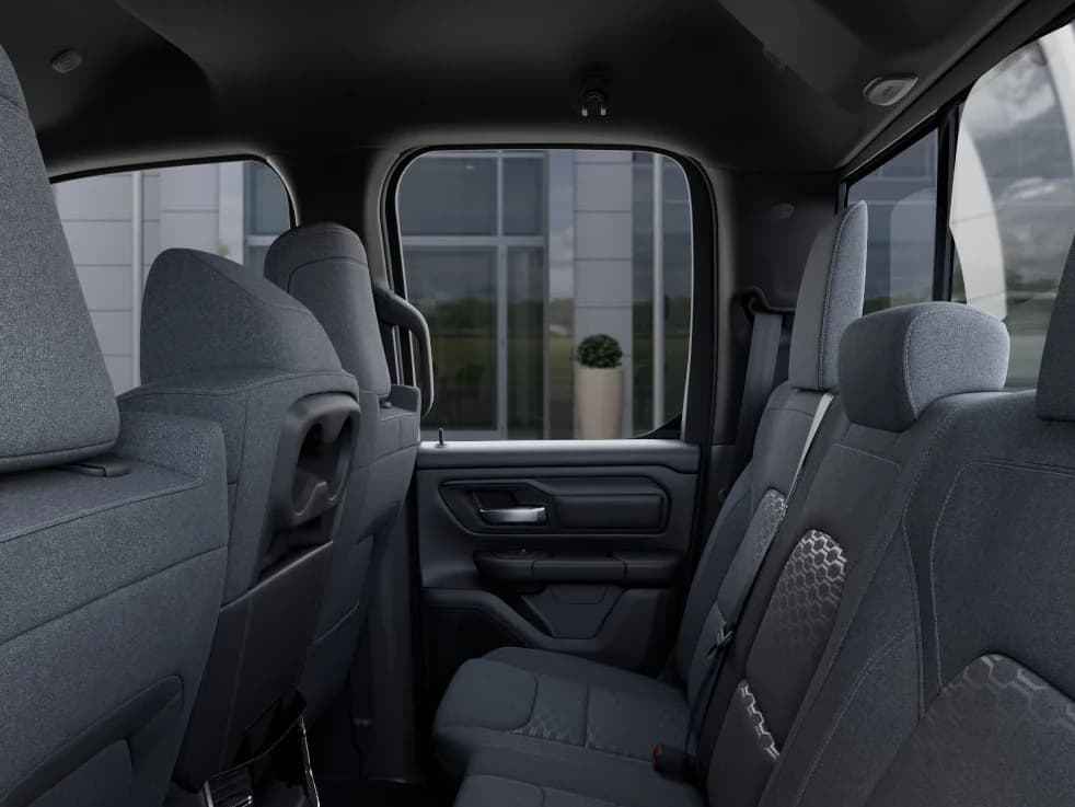 Ram 1500 Tradesman 4x2 Quad Cab 6'4" Box 2026 — side view