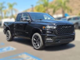 Ram 1500 Big Horn 4x4 Quad Cab 6'4" Box 2026 — side view