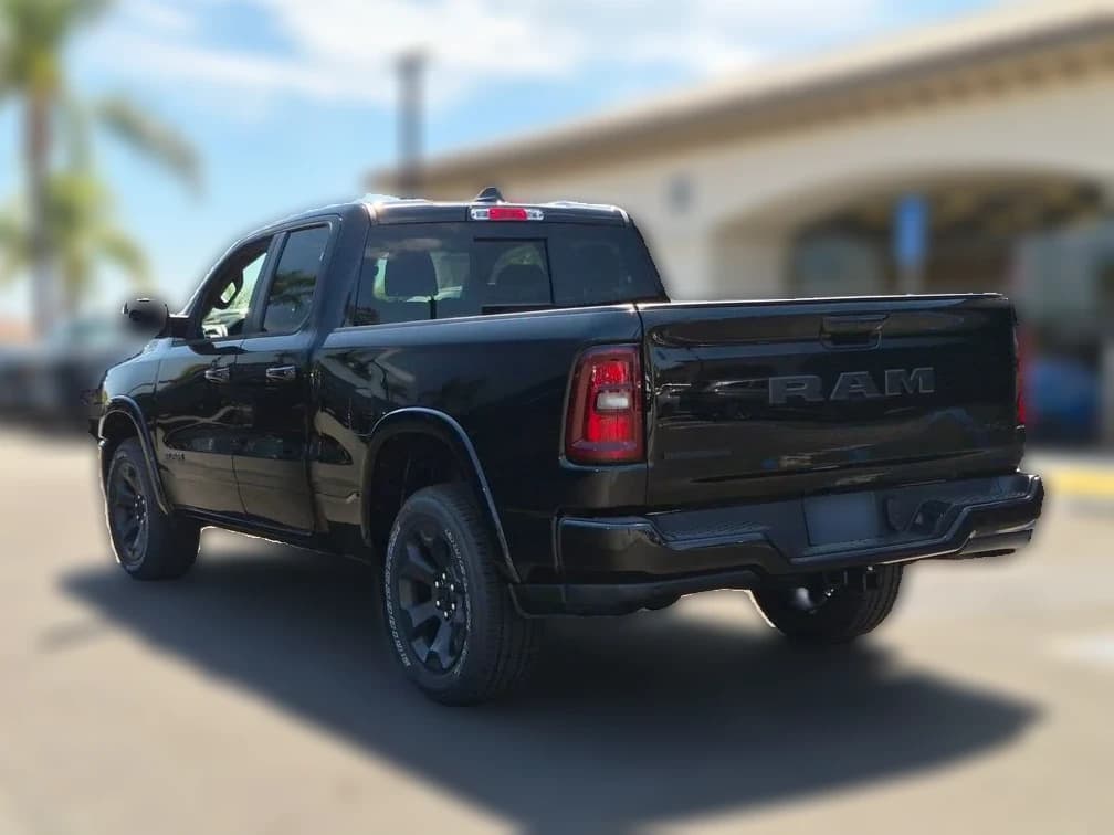Ram 1500 Big Horn 4x4 Quad Cab 6'4" Box 2026 — side view