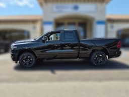 Ram 1500 Big Horn 4x4 Quad Cab 6'4" Box 2026 — side view