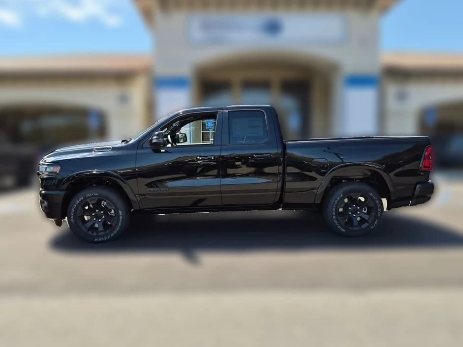 Ram 1500 Big Horn 4x4 Quad Cab 6'4" Box 2026 — side view