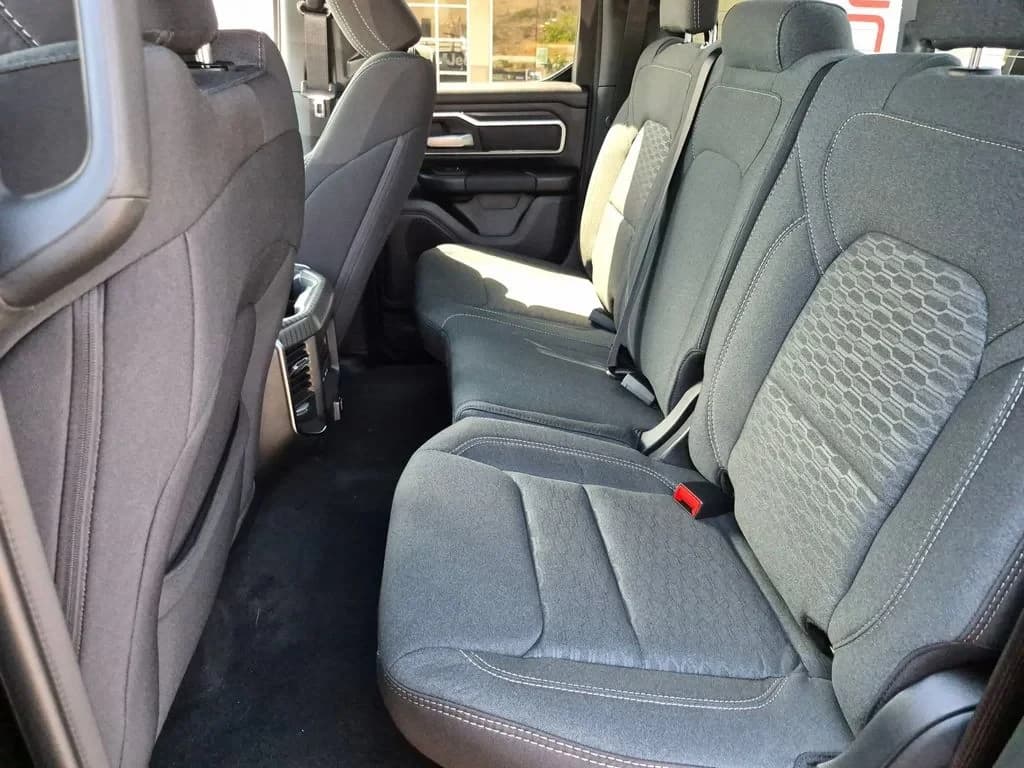 Ram 1500 Big Horn 4x4 Quad Cab 6'4" Box 2026 — side view