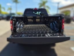 Ram 1500 Big Horn 4x4 Quad Cab 6'4" Box 2026 — side view