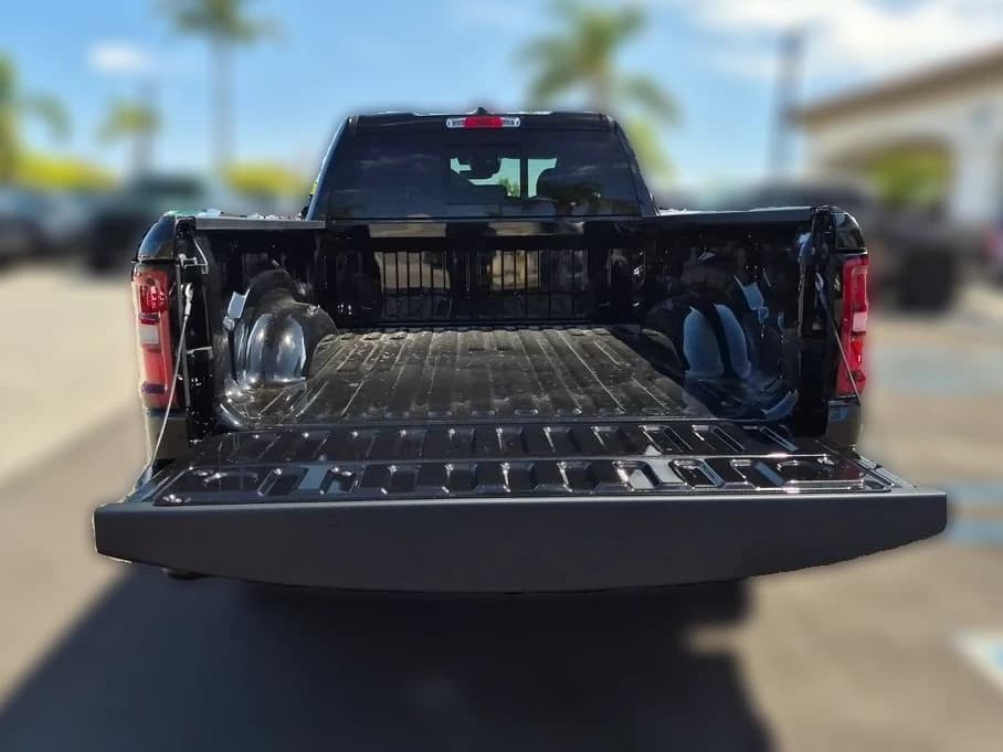 Ram 1500 Big Horn 4x4 Quad Cab 6'4" Box 2026 — side view