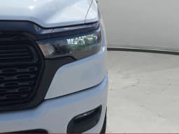 Ram 1500 Express 4x4 Crew Cab 5'7" Box 2026 — side view