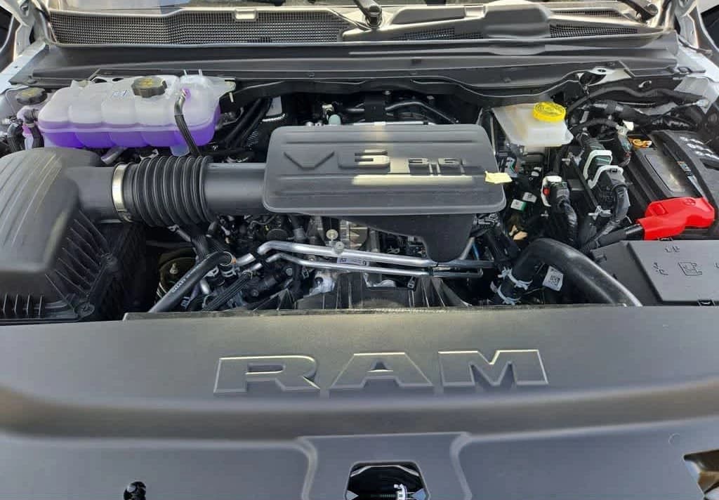 Ram 1500 Express 4x4 Crew Cab 5'7" Box 2026 — side view