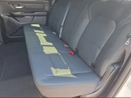 Ram 1500 Express 4x4 Crew Cab 5'7" Box 2026 — side view