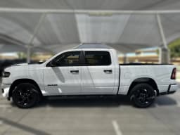 Ram 1500 Express 4x4 Crew Cab 5'7" Box 2026 — side view