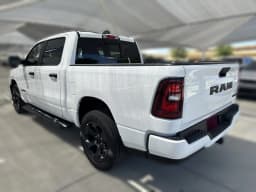 Ram 1500 Express 4x4 Crew Cab 5'7" Box 2026 — side view