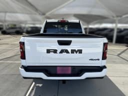 Ram 1500 Express 4x4 Crew Cab 5'7" Box 2026 — side view