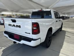Ram 1500 Express 4x4 Crew Cab 5'7" Box 2026 — side view