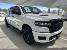 Ram 1500 Express 4x4 Crew Cab 5'7" Box 2026 — side view