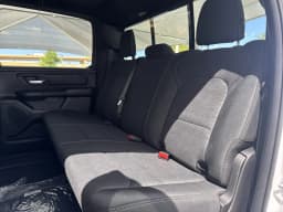 Ram 1500 Express 4x4 Crew Cab 5'7" Box 2026 — side view