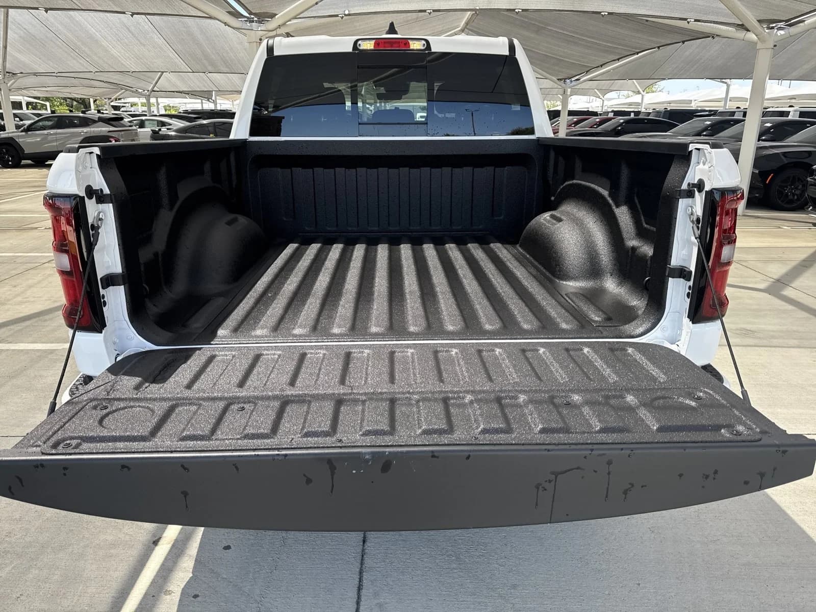 Ram 1500 Express 4x4 Crew Cab 5'7" Box 2026 — side view