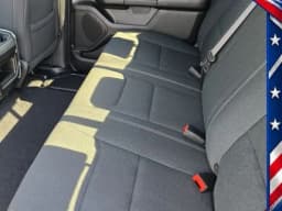 Ram 1500 Express 4x4 Crew Cab 5'7" Box 2026 — side view