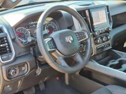 Ram 1500 Express 4x4 Crew Cab 5'7" Box 2026 — side view