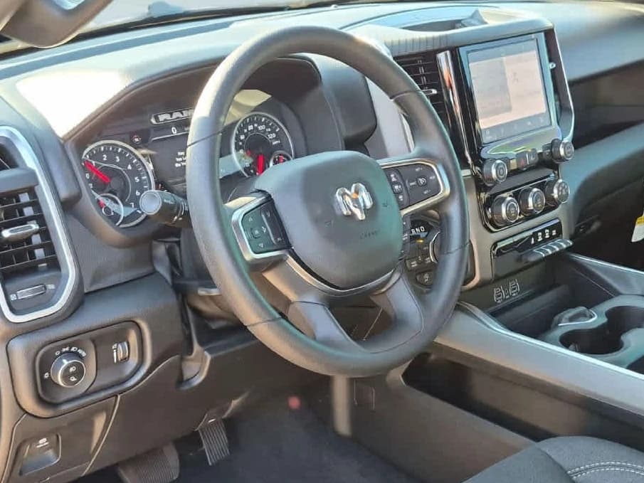 Ram 1500 Express 4x4 Crew Cab 5'7" Box 2026 — side view