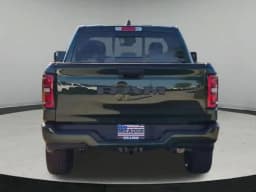 Ram 1500 Express 4x4 Crew Cab 5'7" Box 2026 — side view