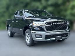 Ram 1500 Big Horn 4x4 Quad Cab 6'4" Box 2026 — side view